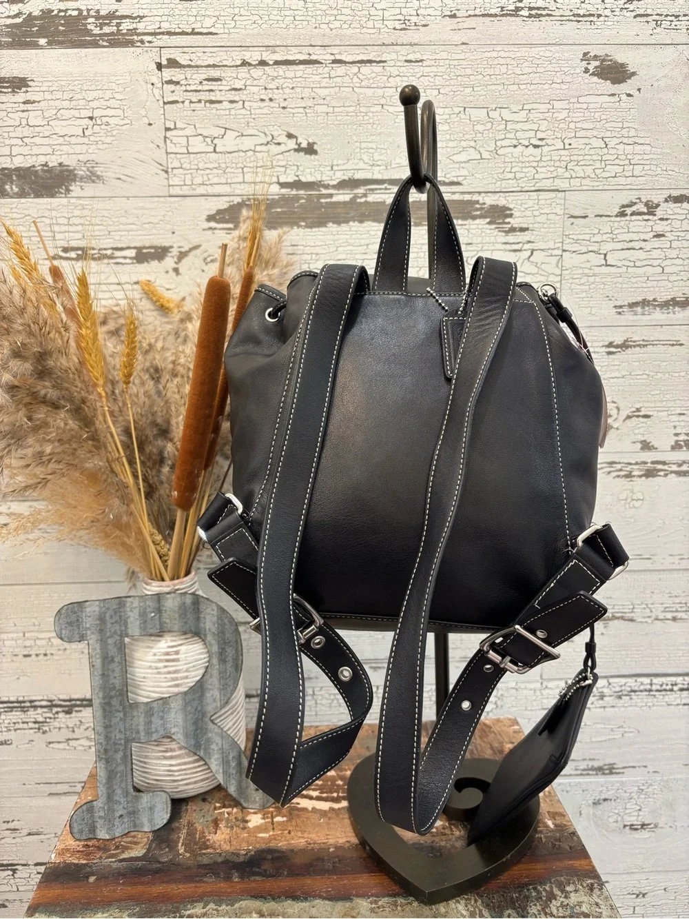 Coach Black Leather Drawstring Backpack with Silver Buckle